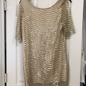 Women’s gold sequin dress